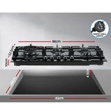 Wide black gas cooktop installed in a kitchen benchtop with pots in use