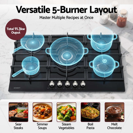 Control knobs across the front of the black glass cooktop