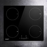 Detail of child lock, timer and boost function controls on the induction cooktop