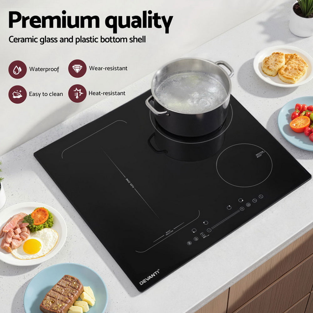 Four induction zones marked on the black ceramic glass surface