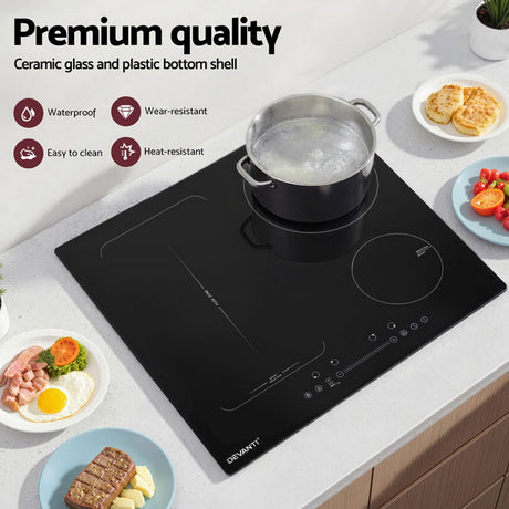 Four induction zones marked on the black ceramic glass surface