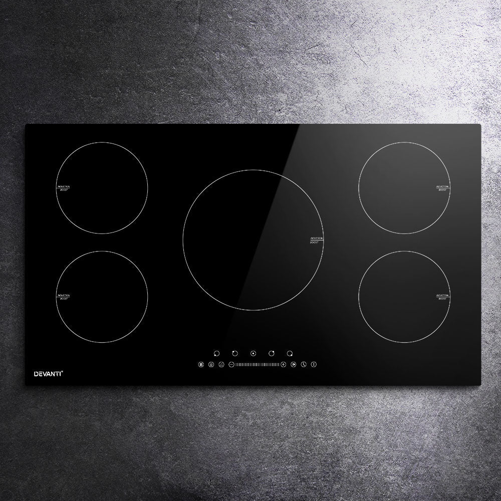 Detail of child lock, boost and 99 minute timer controls on the induction cooktop