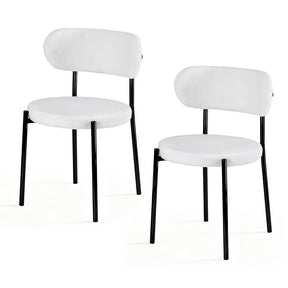 Stirling white sherpa boucle dining chairs with curved backrest in a modern dining room