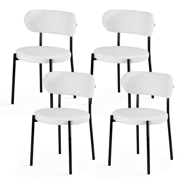 Stirling white sherpa boucle dining chairs with curved backrest in a modern dining room