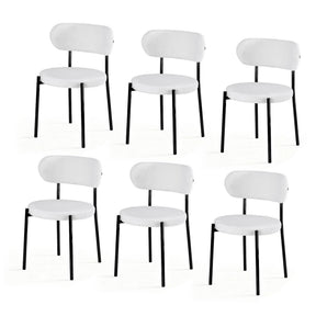 Stirling white sherpa boucle dining chairs with curved backrest in a modern dining room