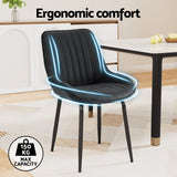 Nain black faux leather dining chair with metal legs in a modern dining room