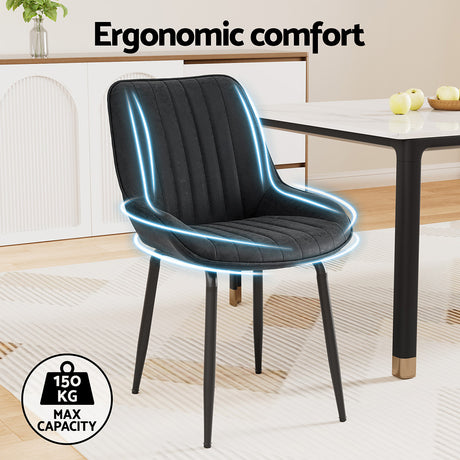 Nain black faux leather dining chair with metal legs in a modern dining room
