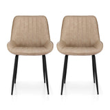 Nain khaki faux leather dining chair with black metal legs in a modern dining room