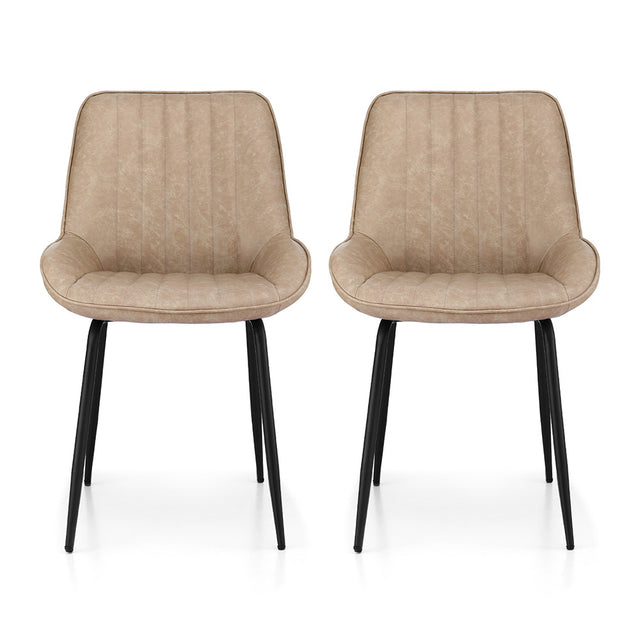 Nain khaki faux leather dining chair with black metal legs in a modern dining room