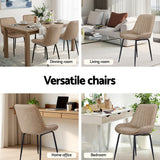 Nain khaki faux leather dining chair with black metal legs in a modern dining room