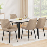 Nain khaki faux leather dining chair with black metal legs in a modern dining room