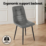 Krondorf grey faux leather dining chair in a modern dining room