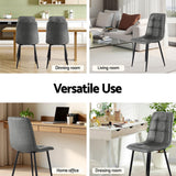 Krondorf grey faux leather dining chair in a modern dining room