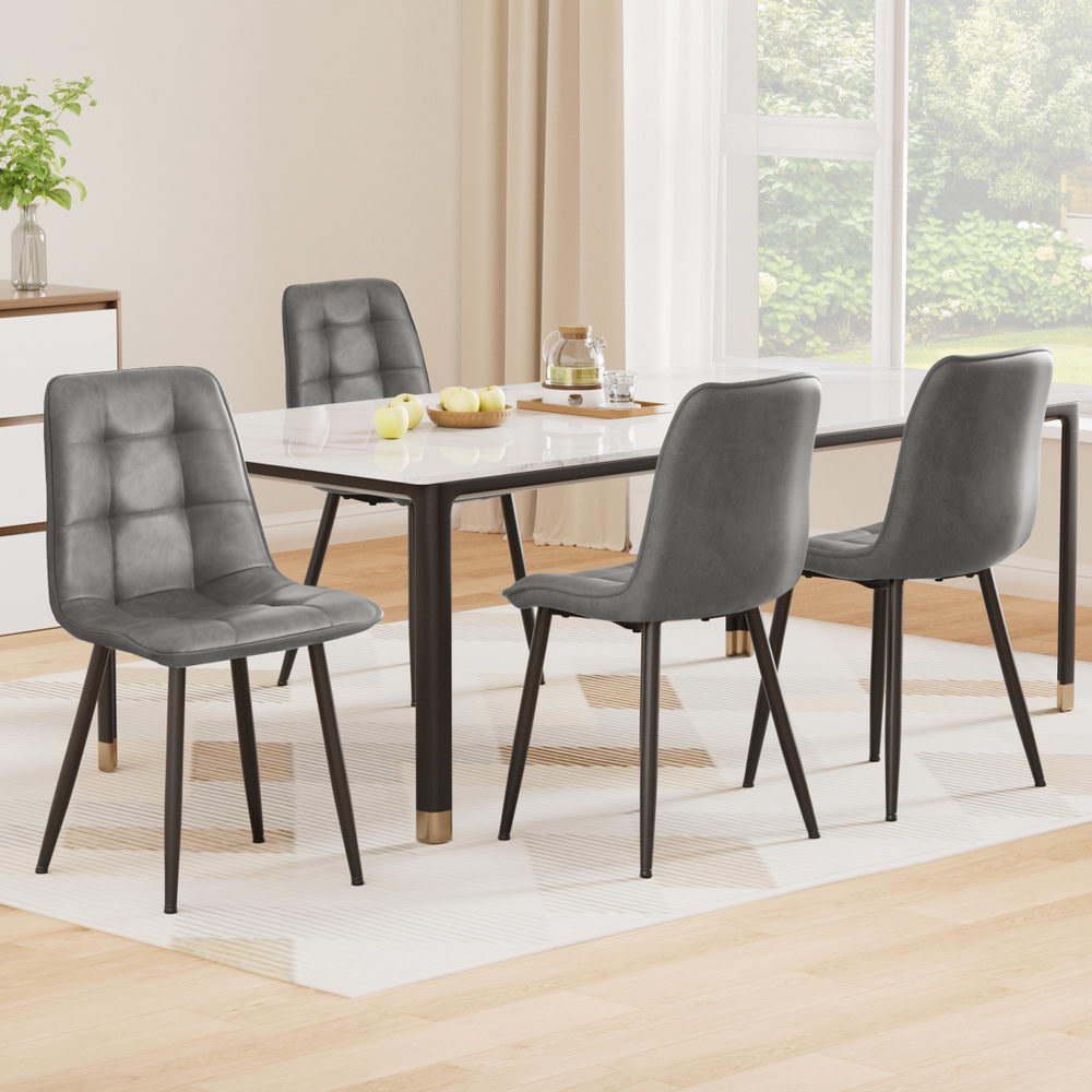 Krondorf grey faux leather dining chair in a modern dining room