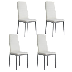 Oakbank white channel tufted faux leather dining chairs with metal frame in a dining room