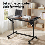 Weston rustic brown drawing desk in a home office