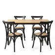 Woodside black rattan dining set in a modern dining room
