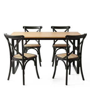 Woodside black rattan dining set in a modern dining room