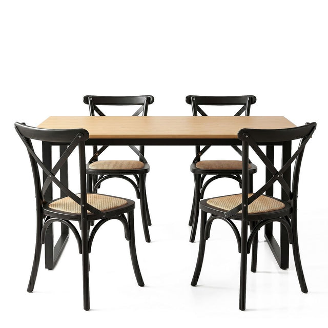 Woodside black rattan dining set in a modern dining room