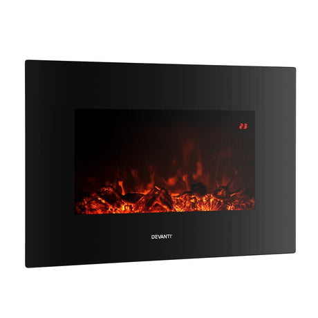 Electric fireplace mounted on a living room wall in the evening
