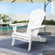 White timber adirondack chair in a garden setting
