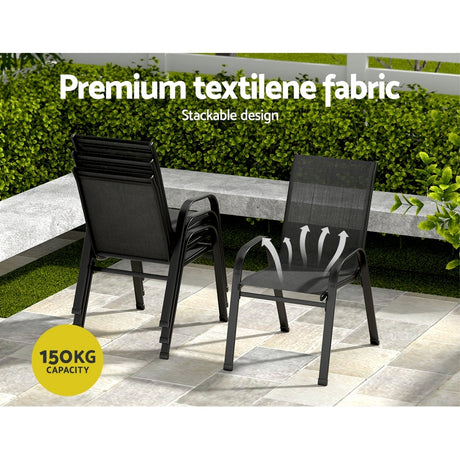 Five piece outdoor dining set with glass table and four black Textilene chairs