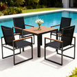 Montacute black steel and wood plastic dining set in a modern dining room