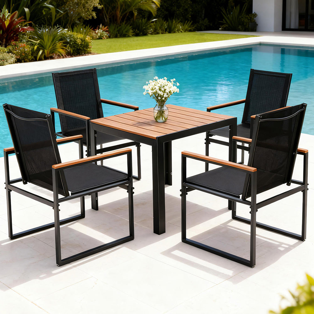 Montacute black steel and wood plastic dining set in a modern dining room