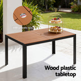 Textilene outdoor dining chairs around a WPC table