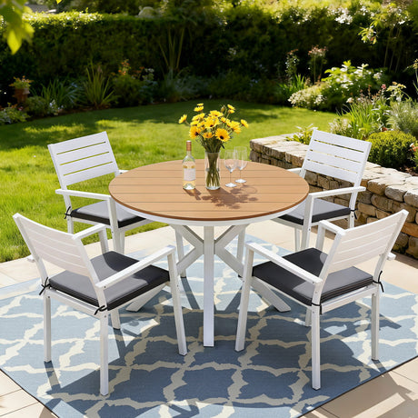5 piece aluminium outdoor dining set with WPC tabletop and four white cushioned chairs