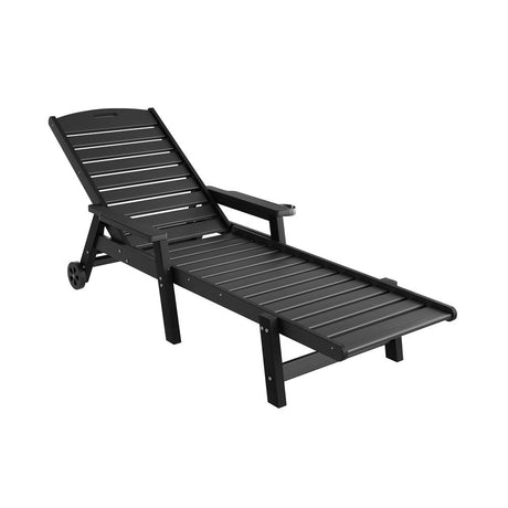Kiama black HDPE sun lounger with wheels reclining on a patio