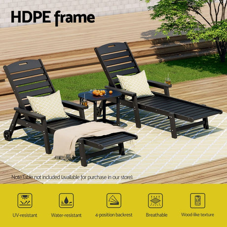 Kiama black HDPE sun lounger with wheels reclining on a patio