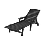 Kiama black HDPE sun lounger with wheels reclining on a patio