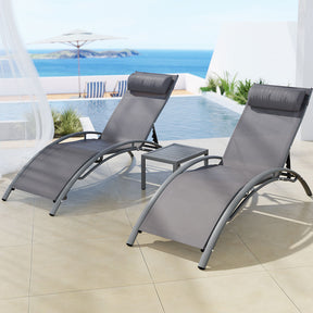 Grey textilene reclining sun lounger beside a pool