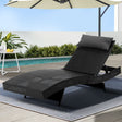 Adjustable rattan wicker reclining sun lounger beside a pool
