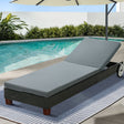 Black aluminium reclining sun lounger beside a pool