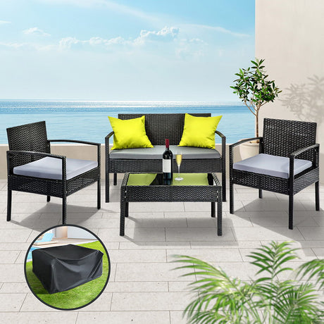 Tin Can Bay black wicker outdoor sofa set in an outdoor setting
