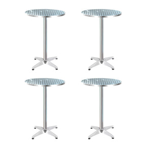Bowen round silver aluminium outdoor bar table in an outdoor setting