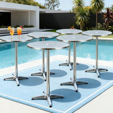 Bowen round silver aluminium outdoor bar table in an outdoor setting