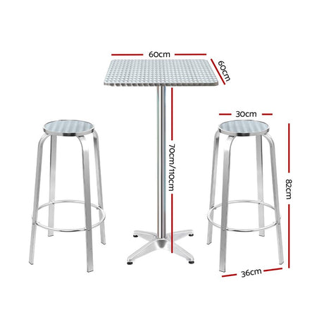 Black Rock silver aluminium 3 piece outdoor bar set with two stools and adjustable table on a patio