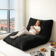 Leura dark grey 3 in 1 convertible bean bag chair in a relaxed living room