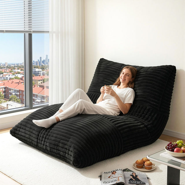 Leura dark grey 3 in 1 convertible bean bag chair in a relaxed living room