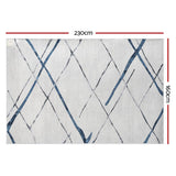 Geometric short pile flannel floor rug in blue grey