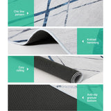 Geometric short pile flannel floor rug in blue grey