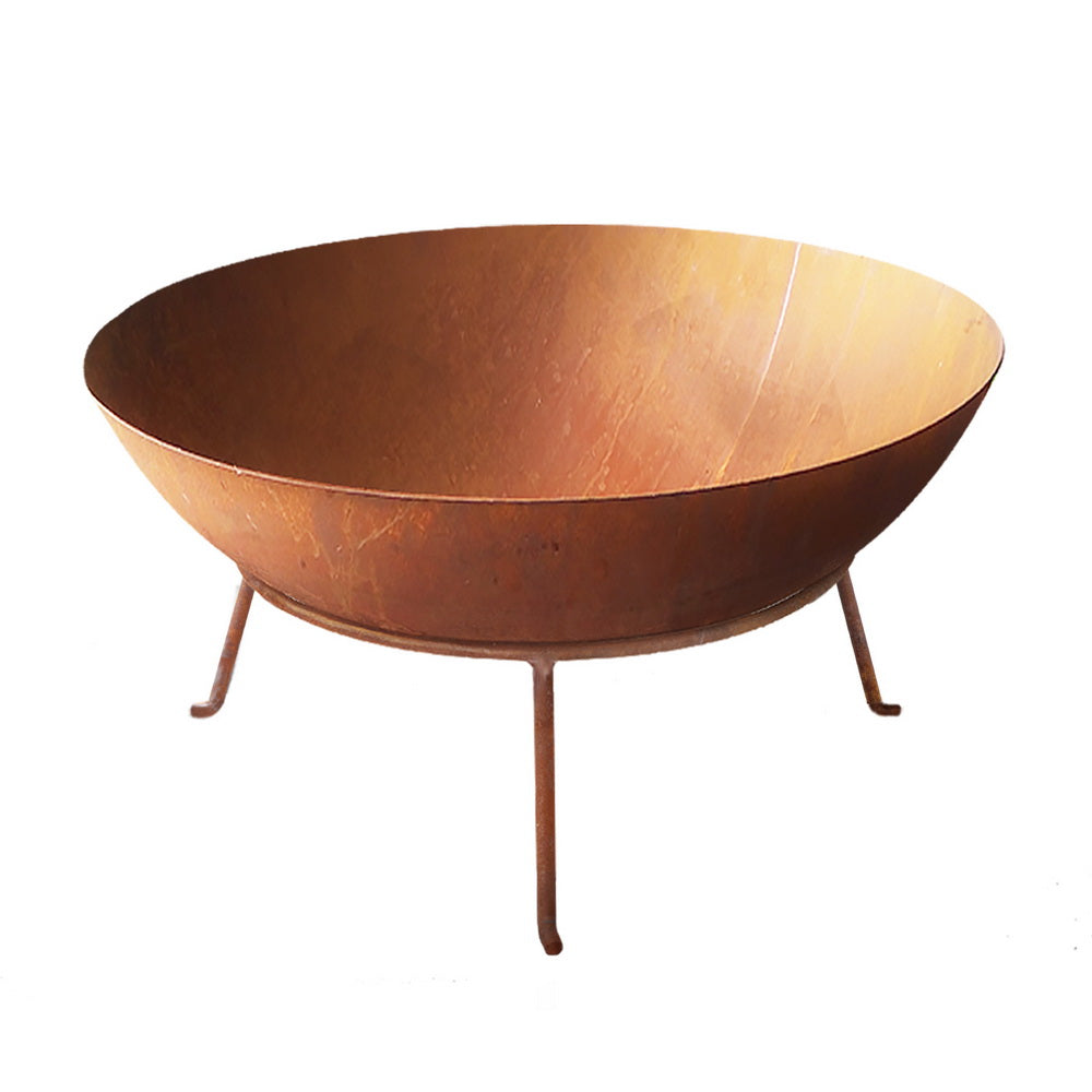 Katherine 70cm rustic steel fire pit with a naturally rusted milk can silhouette in a garden