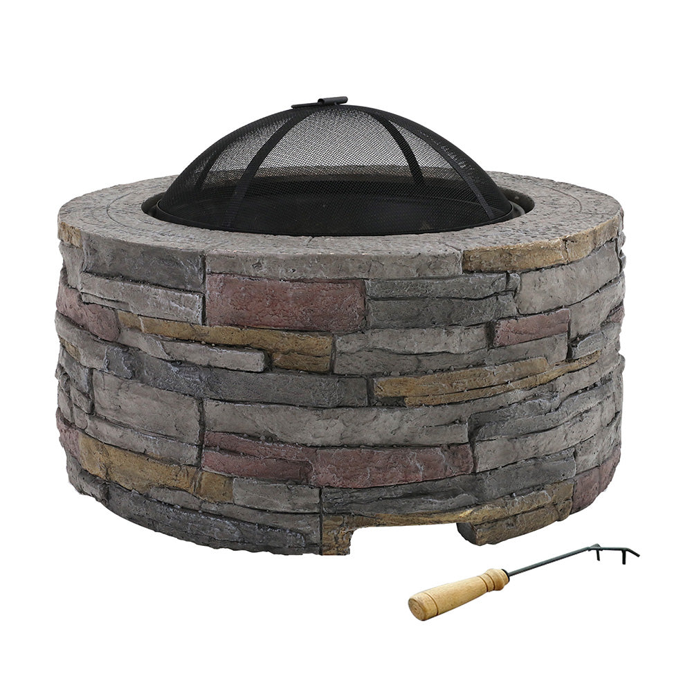 Litchfield 70cm round rustic fire pit table with safety mesh dome in a backyard