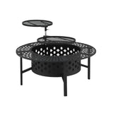 Stokes Bay 91cm 3 in 1 steel fire pit, BBQ and table with star cut out design in a backyard