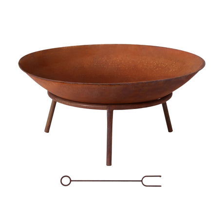 Cape Borda rustic iron fire pit bowl with natural rust finish in a garden