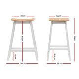 Edithvale oak wooden bar stool with saddle seat in a bright kitchen