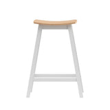 Edithvale oak wooden bar stool with saddle seat in a bright kitchen